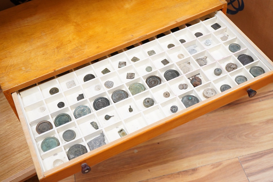 A collection of mainly Medieval to 19th century bronze and lead imperial circular trade weights, with a few Roman and later examples, stamped with Royal Cyphers, weights, the dagger assay mark for London, other proof mar